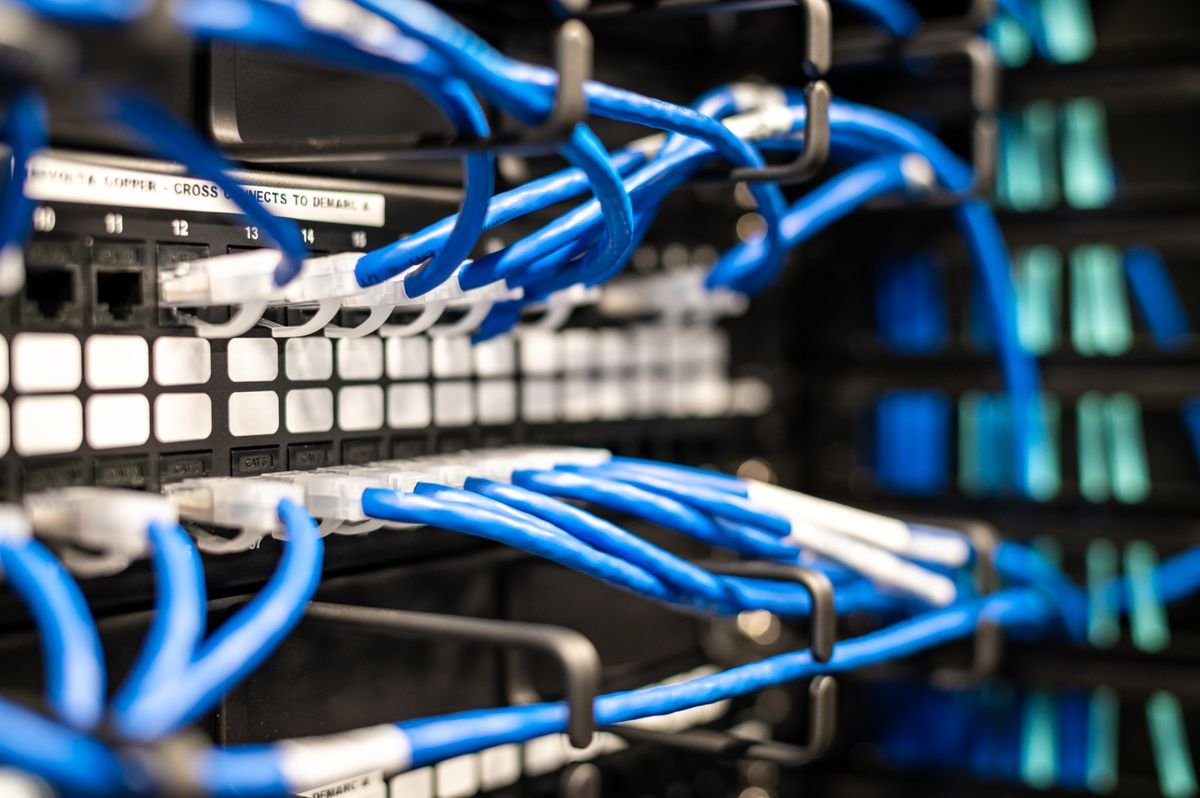 Field technician working on network equipment